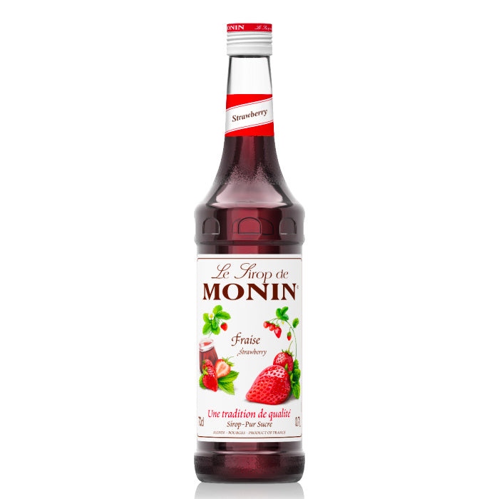 Fles Le Sirop de MONIN Strawberry – aardbeiensiroop met zoete, frisse smaak, perfect voor cocktails, mocktails en zomerse drankjes. Verkrijgbaar bij Sherlocks Place Rotterdam