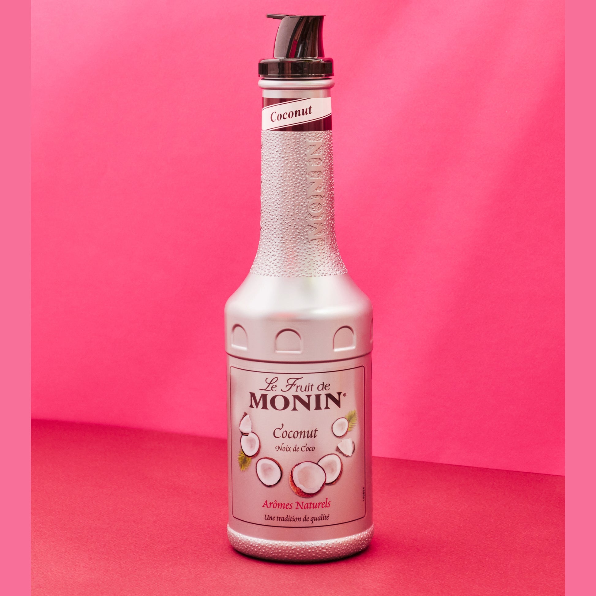 Sherlocks Place Rotterdam Coco Fruitpuree Monin fles roze achtergrond